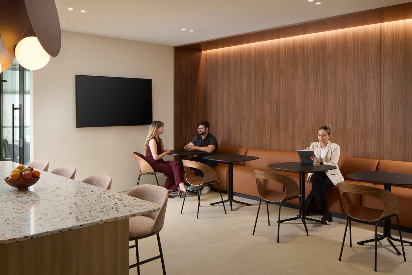 Venable's Miami office: reception with a marble desk beneath a coffered walnut ceiling, conference rooms beyond, photograph 7