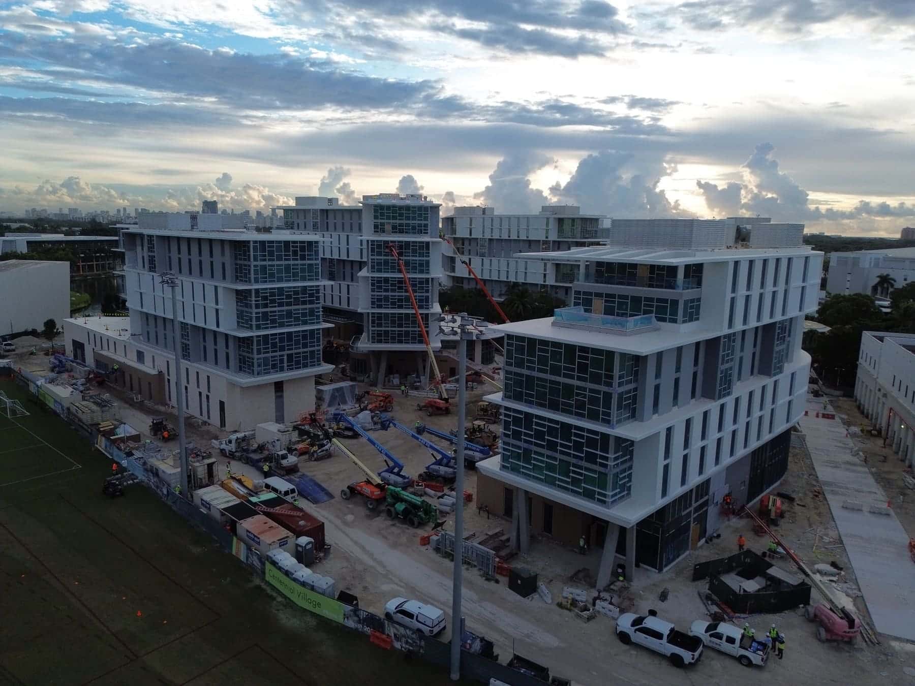Centennial Village under construction at the University of Miami, seen from above at dusk